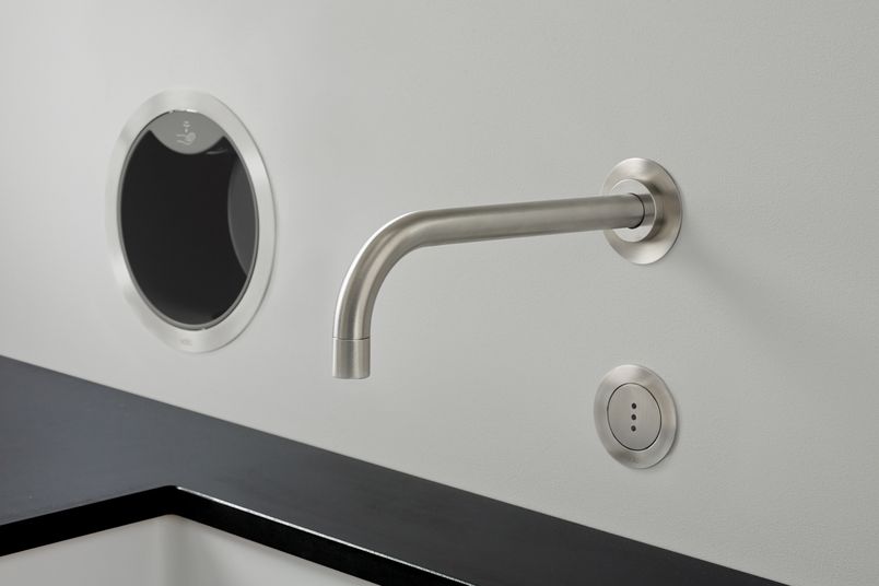 The VOLA RS10 is a wall-integrated, fully automated electronic soap dispenser.