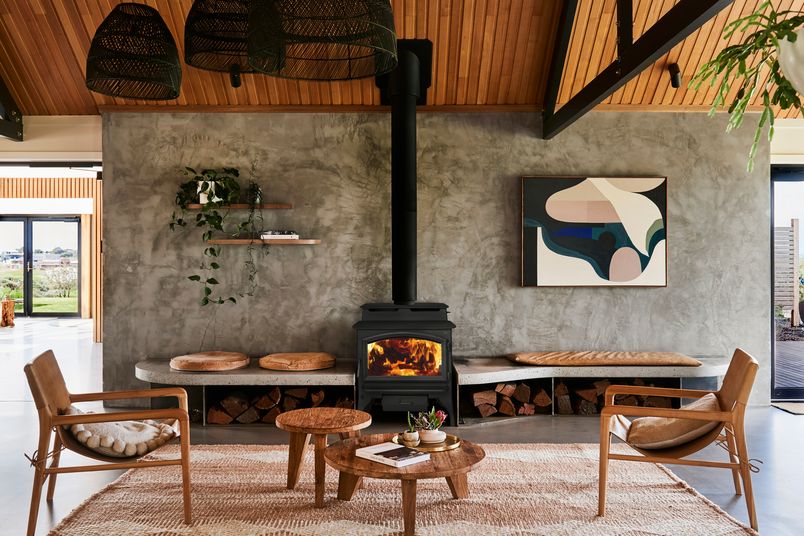 A wood-burning firebox warms this cosy retreat.