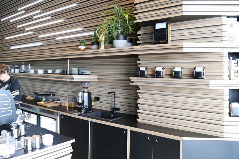 A feature wall made with Futura HPL birch plywood from Big River Group.