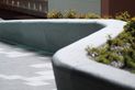 A granite bench from Sai Stone with flamed finish.