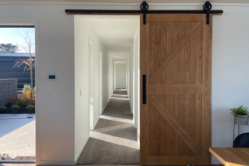 The use of barn doors in your home can enhance the functionality of doorways.