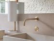 The VOLA 4321 basin tap in Brushed Gold features an on-off sensor.